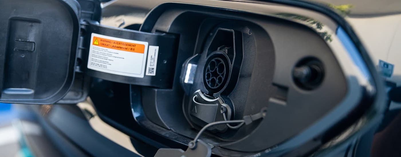A closeup shows the charging port on a 2020 Kia Niro EV.