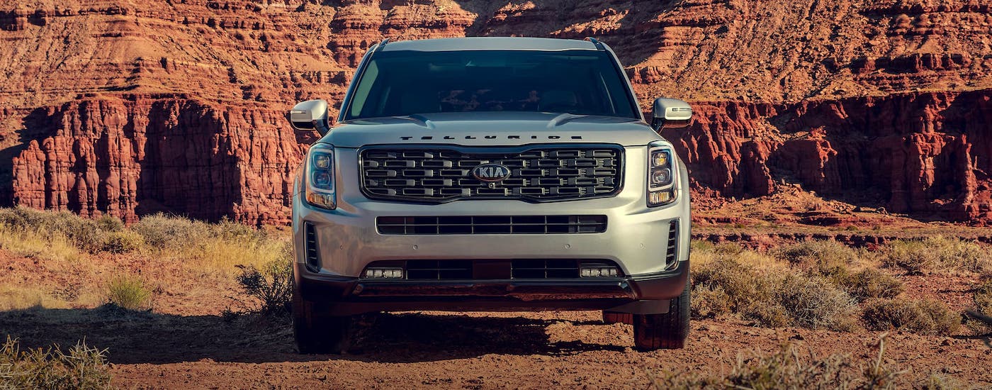 A silver 2021 Kia Telluride is shown from the front in front of a canyon.